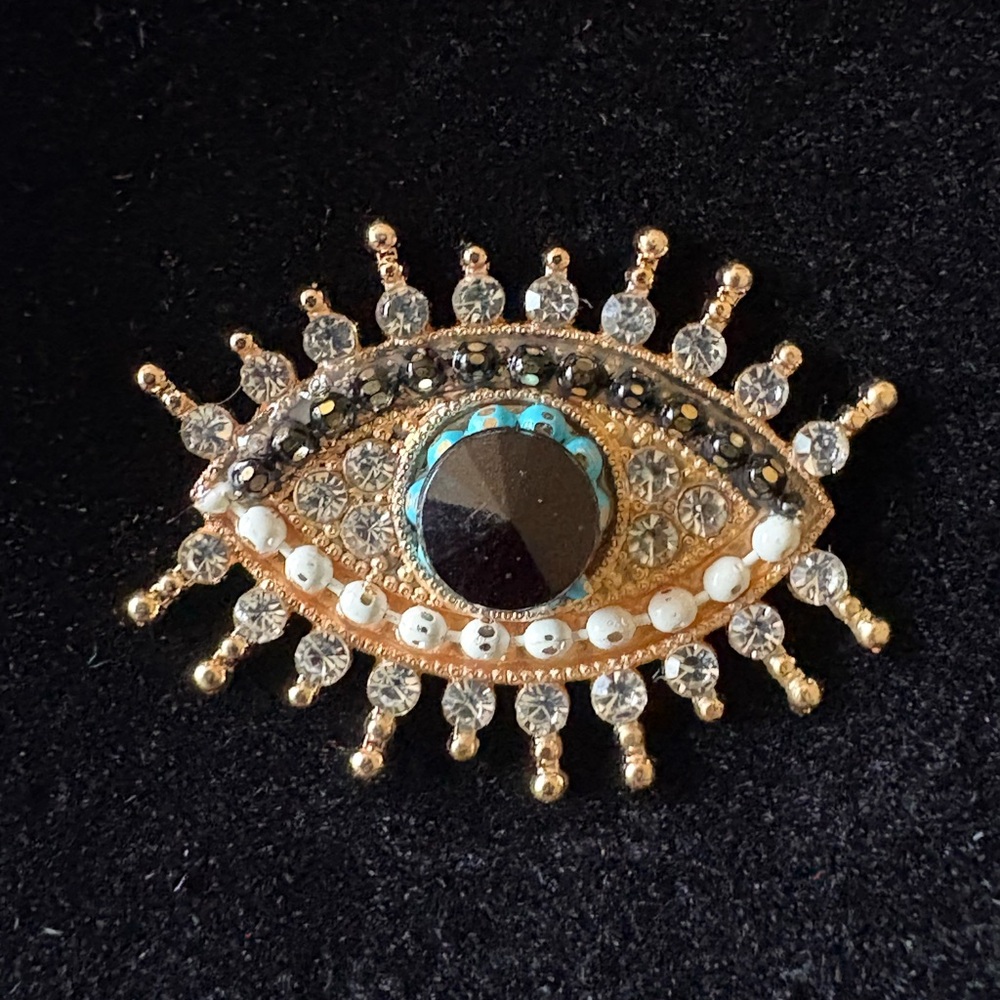 Elegant Gold and Black Evil Eye Brooch